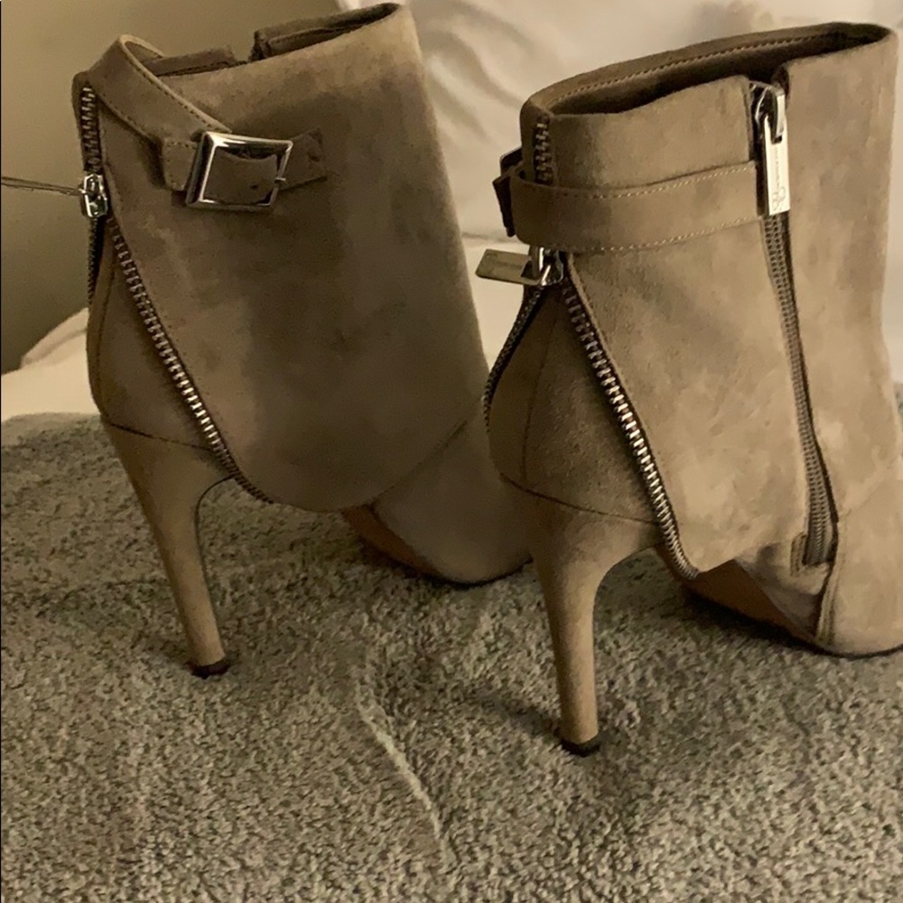 Jessica Simpson booties in a light beige color